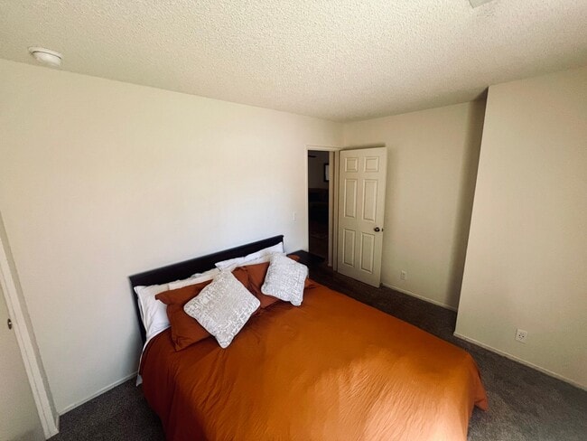 Building Photo - Affordable Comfort in 55+ Guard-Gated Comm...