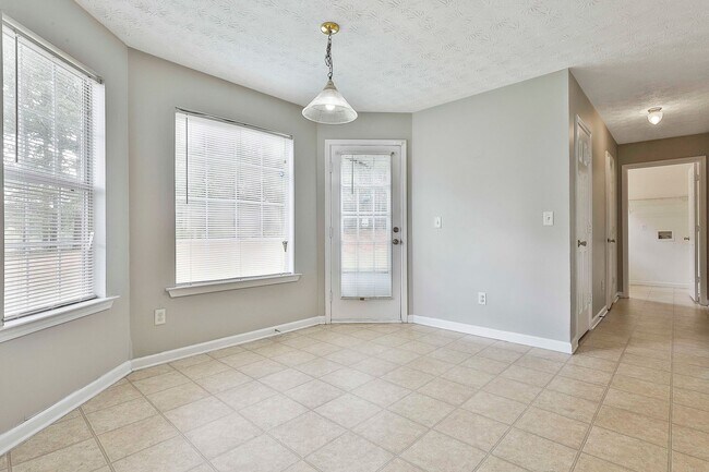 Building Photo - 4BR Home with Lake View in Swim Tennis Community