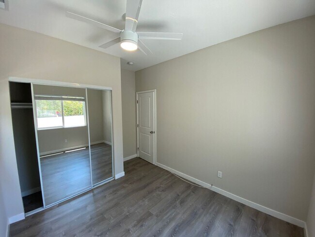 Building Photo - NEW (2023) 4BD/2BA!! Back gate exits right...