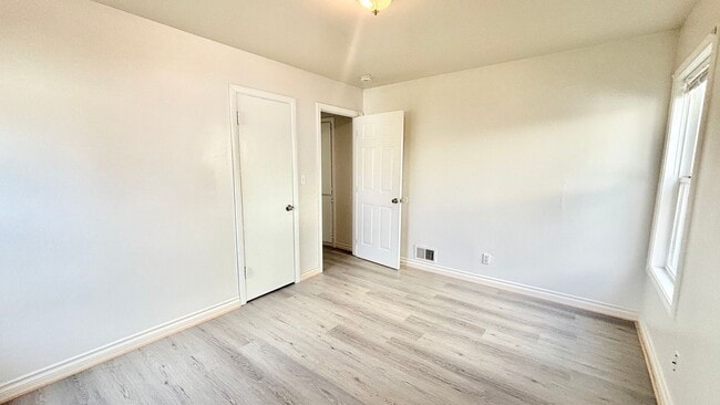 Building Photo - Recently Renovated House With Fenced Back Yard, Attached Garage, and Basement