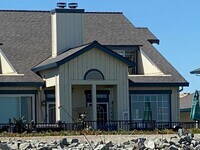 Building Photo - Fabulous Waterfront Condo with Private Boa...
