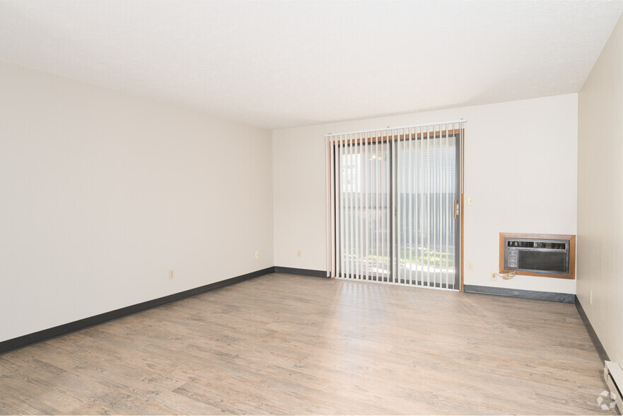 2BR, 1BA - 1050SF - Living Room - Colfax Sandhill Apartments