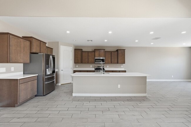 Building Photo - Spacious 5-Bedroom Home with Open Floor Plan & Private Backyard