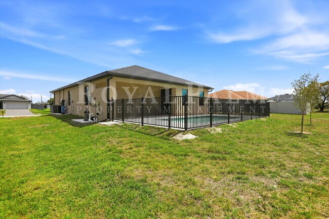 Building Photo - 3BR/2BA New Construction with Pool, Fence & Garage — Built Yesterday, Ready Today - Cape Coral