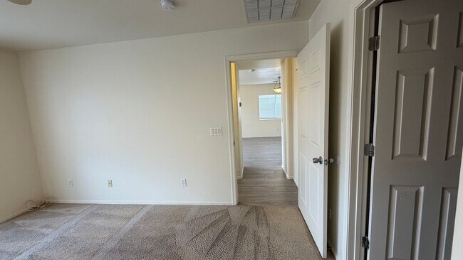 Building Photo - Two Story Home with NEW tile and a large backyard!