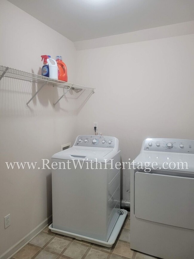 Building Photo - Gorgeous 3-Story Brick Home / 2 Fireplaces / Full Finished Basement / Chapel Hill Schools