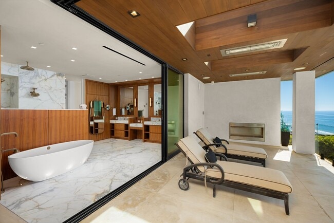 Building Photo - Luxury Coastal Escape w/ Resort-Style Amenities & Stunning Views