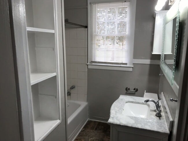 Building Photo - 3 Bedroom/1 bath home on corner lot with a large fenced back yard