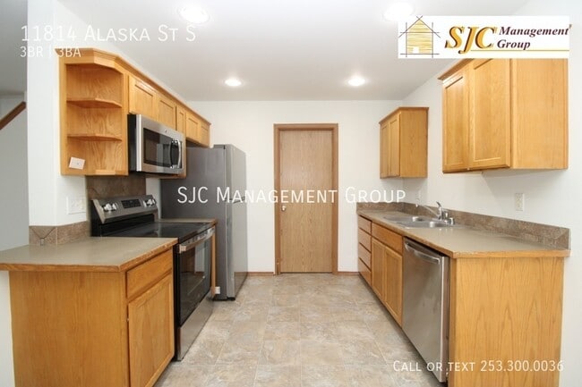 Building Photo - 11814 Alaska St S