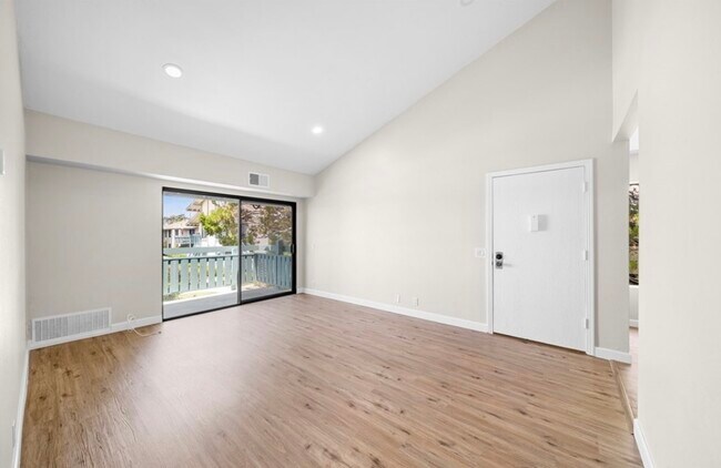 Living room, front door - 20415 S Vermont Ave