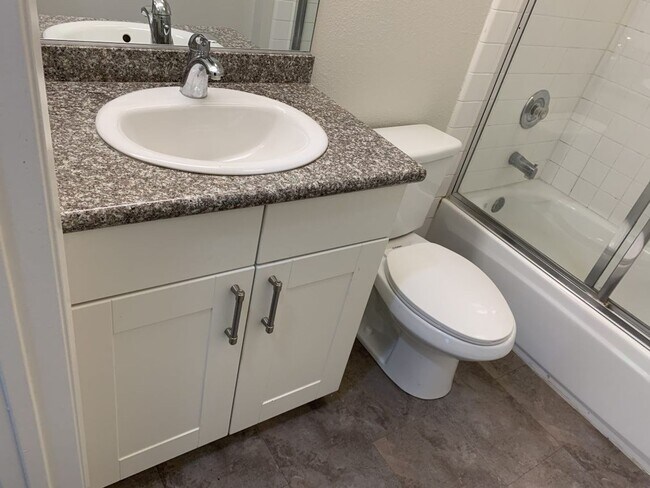 Building Photo - Sabre Springs Top Floor Condo with Carport