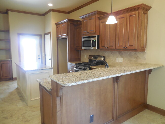 Building Photo - Fully Furnished Three Bedroom, Two Bathroo...