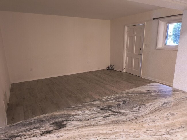 Building Photo - NEW LOWER PRICE  Wonderful 2 Bedroom 1.5 Bathroom condo