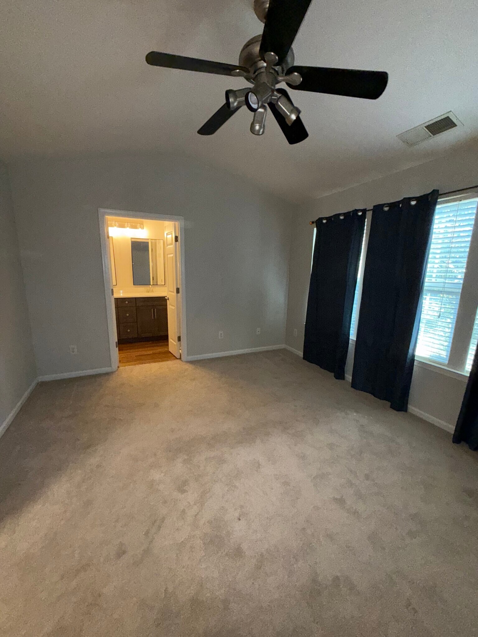 Master bedroom with vaulted ceiling - 6617 Rothchild Dr