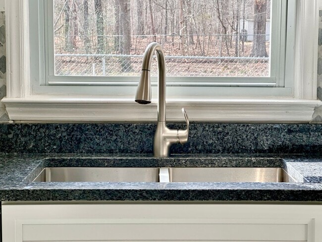 Building Photo - Updated 3BR Ranch | Large Lot, Deck & Modern Finishes – Minutes to Durham