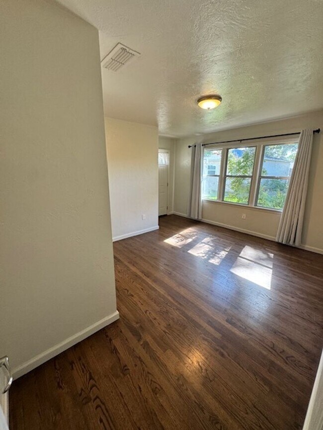 Building Photo - Charming Updated 4-Bedroom Home in the Garden Tract – Hardwood Floors, Central Air, 2-Car Garage ...