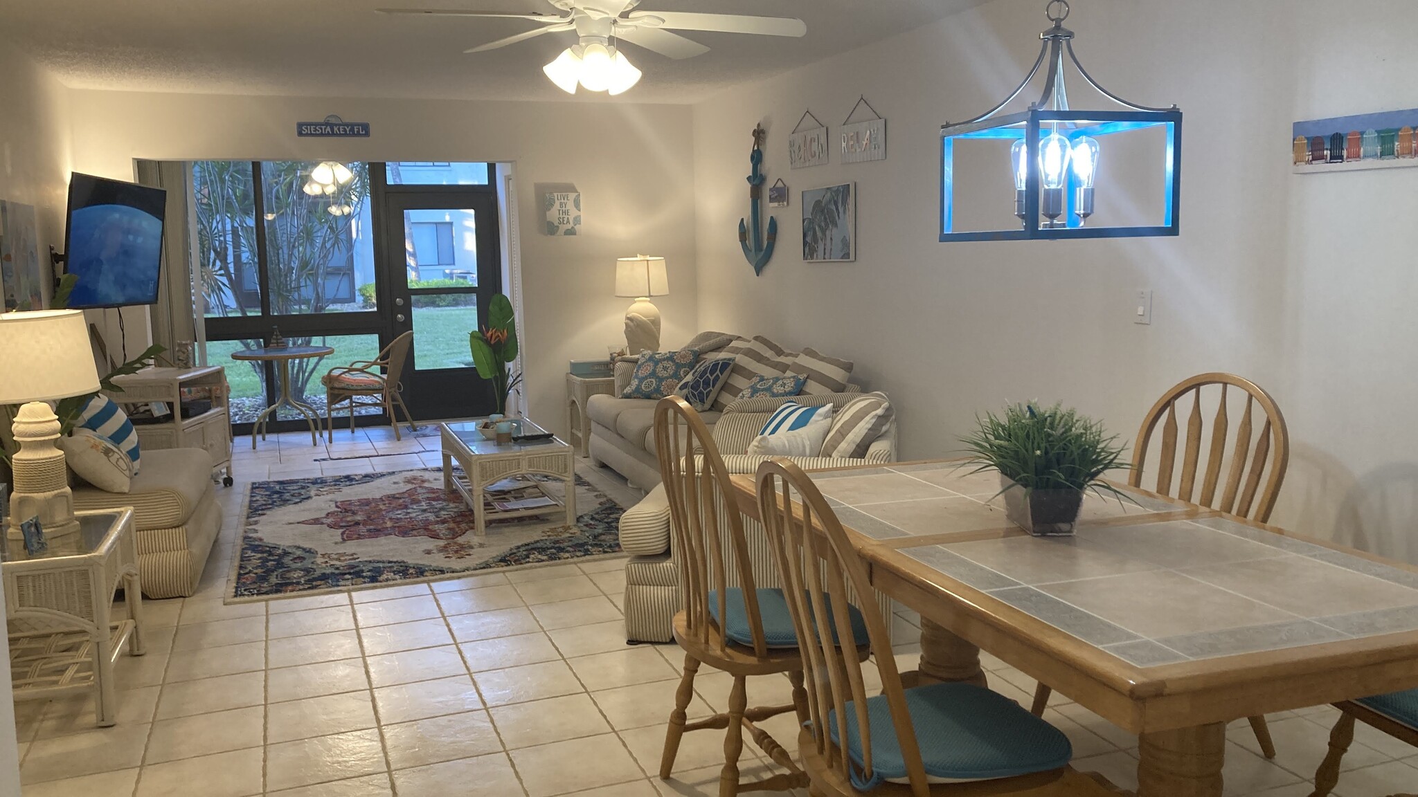 Beach themed living space and dining - 1642 Stickney Point Rd