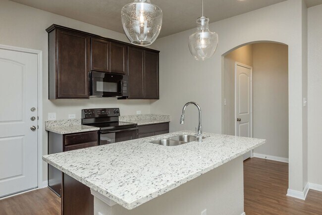 Building Photo - Live, love, and grow in this charming townhome!