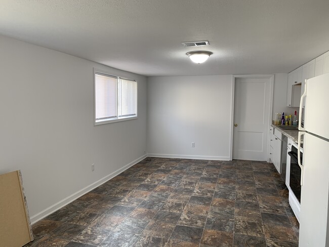 Kitchen with extra storage and laundry room - 501 Bourne Ave