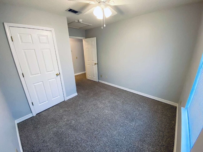 Building Photo - Fantastic location! This end unit offers t...