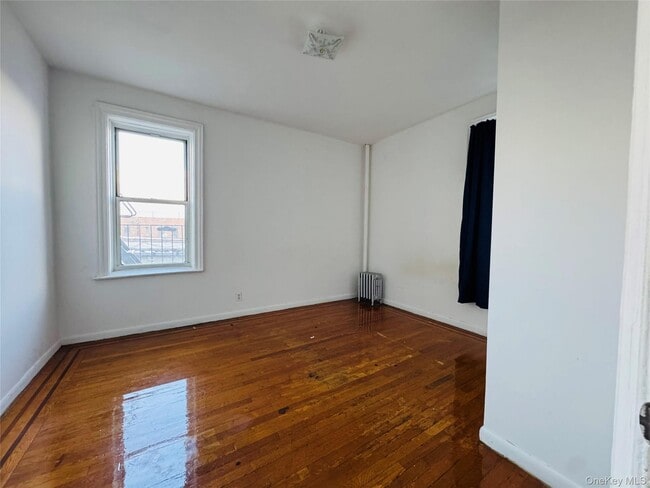 Building Photo - 37-80-80 64th St