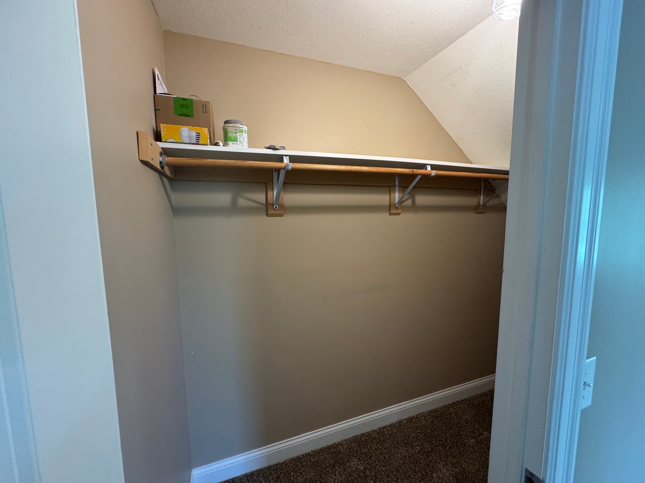 Large storage closet beneath stairs on 1st floor. - 1343 Easy St
