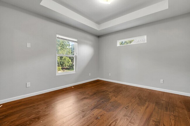 Building Photo - Modern Comfort Meets Prime Location — Styl...