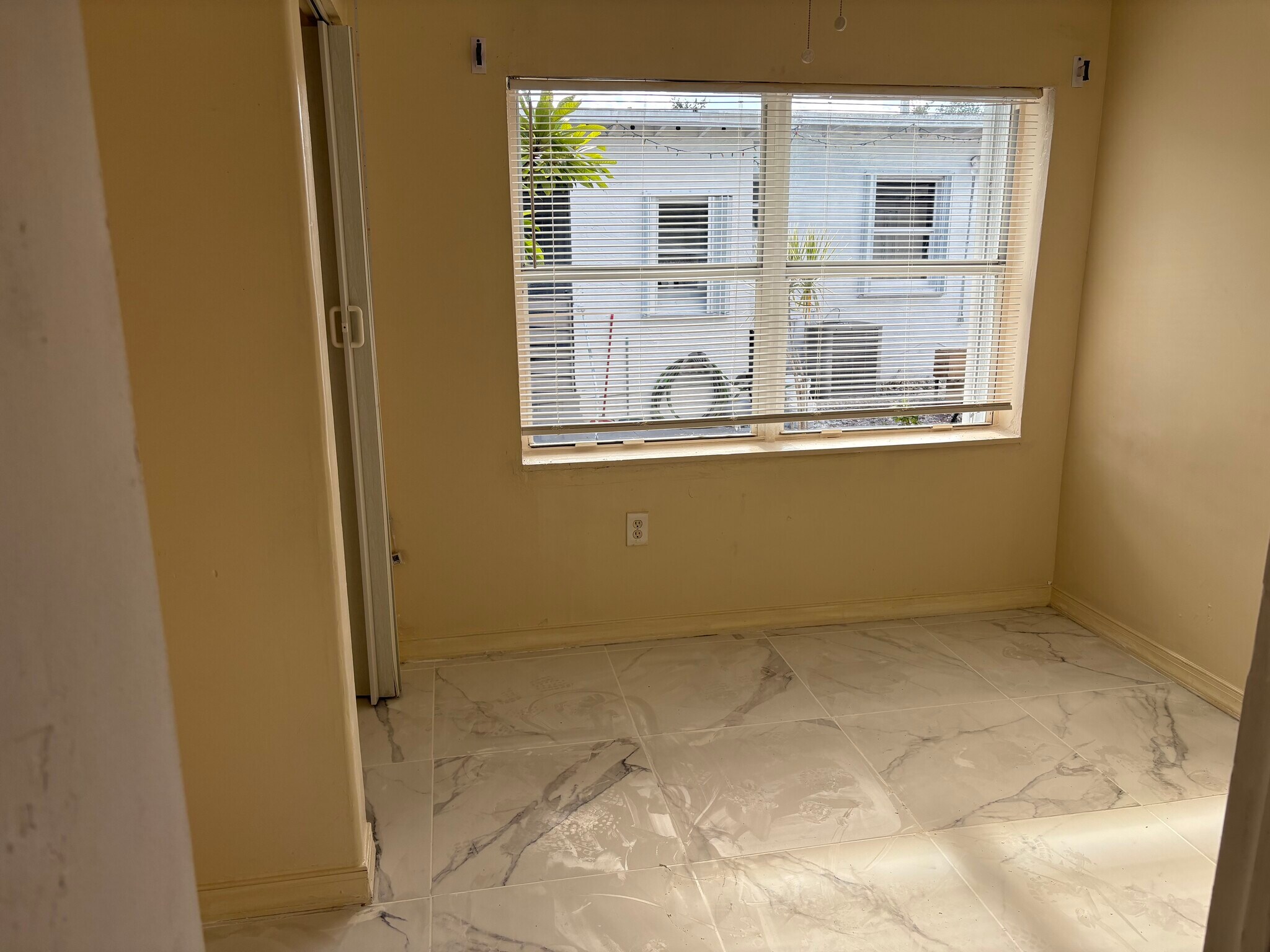 One bedroom last tenant had full size bed with TV on wall - 209 NW 28th Ave