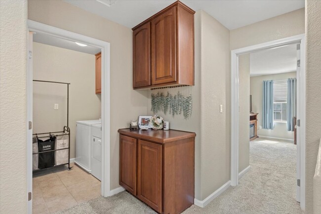 Upstairs Laundry Room & Linen/Storage - 807 Esplanade Cir