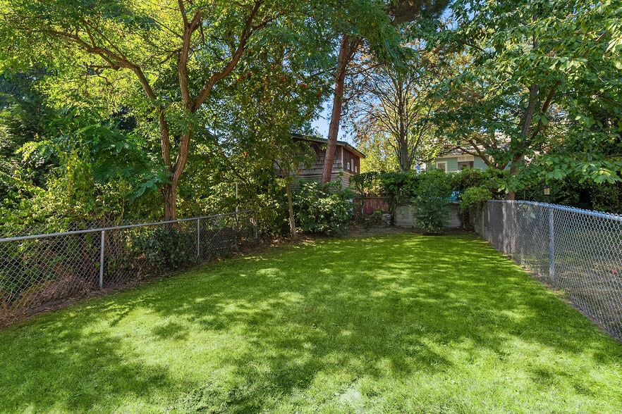 Add your picnic table and hammock and make this your private garden sanctuary! - 7051 8th Ave NW