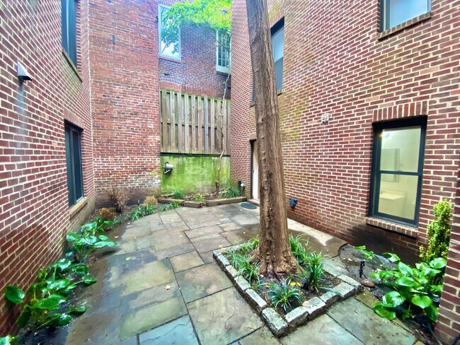 Building Photo - SAVE OVER $200!* Dupont Circle 1 Bedroom Charmer with Patio, Fireplace, Central Air, Washer/Dryer!
