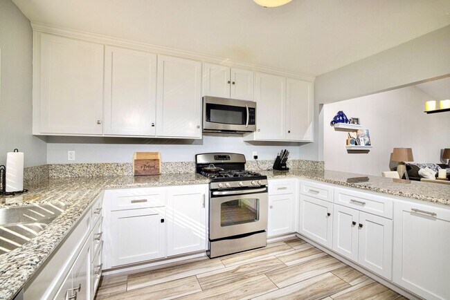 Building Photo - Beautifully Updated & Remodeled Upstairs Condo Unit in the Serene Pala Mesa Villas HOA Community,...