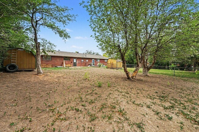 Building Photo - Spacious 3-Bedroom Home with Refinished Hardwood Floors, Fresh Interior Paint, Private Fenced Yar...