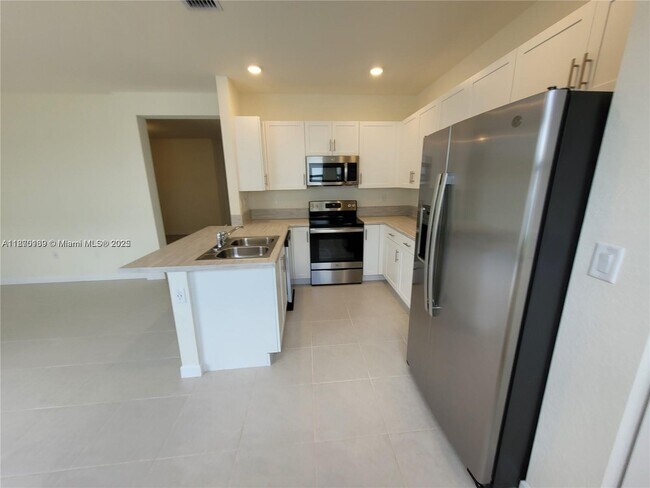 Building Photo - 11125 West 33rd Ct