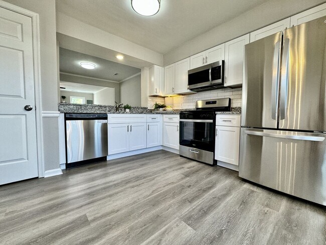 Building Photo - COMPLETELY Updated & Ready 08-21-26!! Sparkling Community Pool - Pet Friendly - Fenced Backyard!