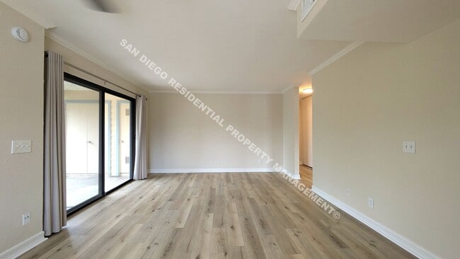 Building Photo - Highly Updated 2-Bedroom Condo in Prime Mi...