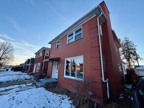 Building Photo - Three bedroom One and a half bath Brick Colonial home for lease