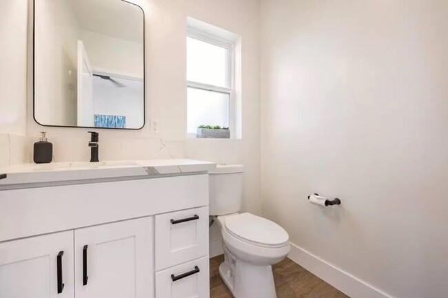 The half bath upstairs is very convienent.. - 3355 Lloyd St