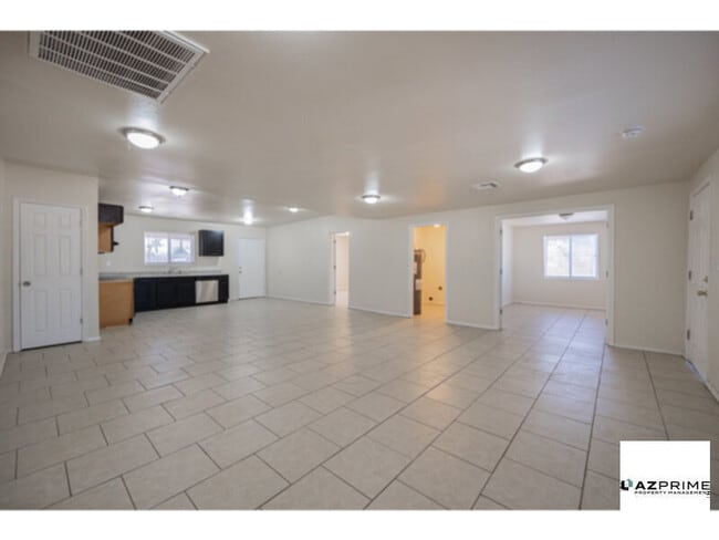 Building Photo - Experience comfort and space in this Custo...