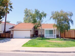 Building Photo - Updated Home, Central A/C & No Carpets! Pe...