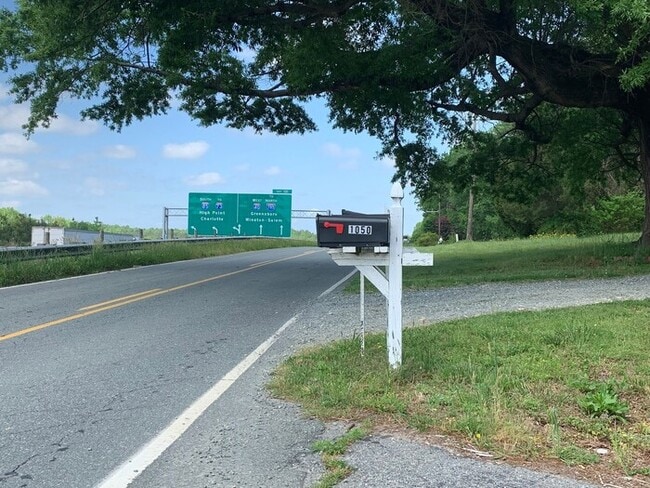 Building Photo - McLeansville - Minutes from Elon & Greensboro! Few Acres, Brick Duplex, Just Painted, New Carpet,...