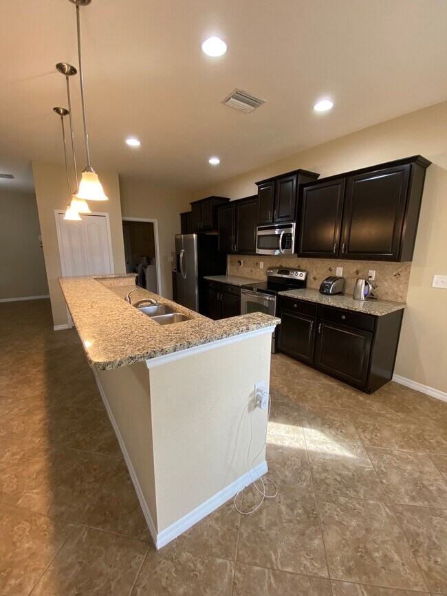 Building Photo - 5452 Mang Pl