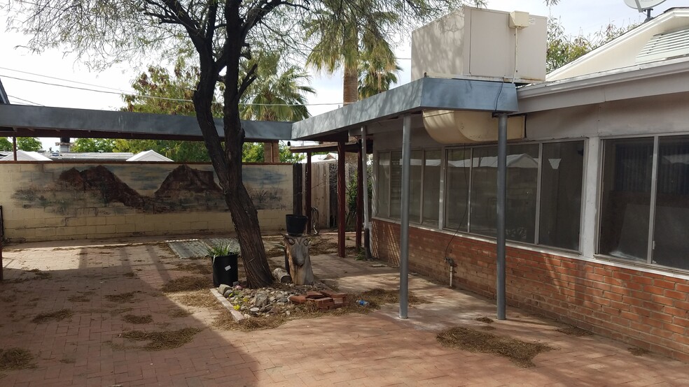 Back private patio area. - 201 E Alice Ave