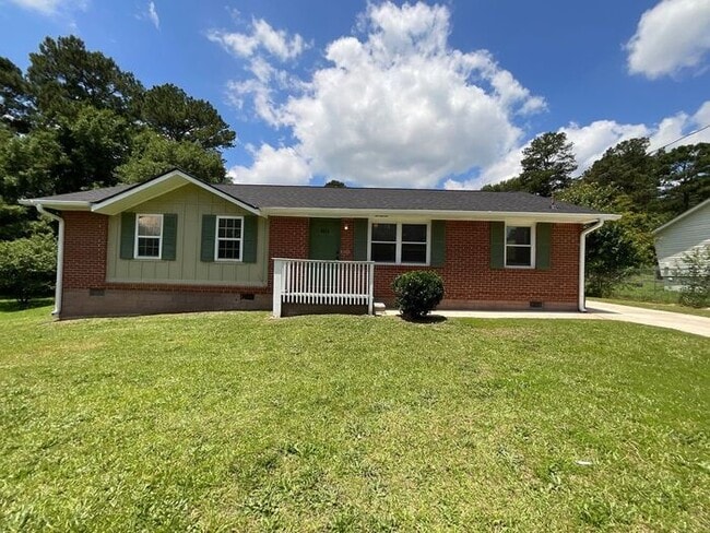 Primary Photo - Stylish 3-Bedroom with Expansive Yards in ...