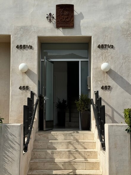 entry door w/ security cameras around - 455 N Spaulding Ave