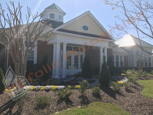 Building Photo - Beautiful 3 Story 3 Bedroom Townhouse with Huge 1st Floor Flex Space with Access to Patio + 2 Car...