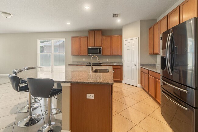 Building Photo - Stunning Avalon Park 4 Bed / 3 Bath Home f...