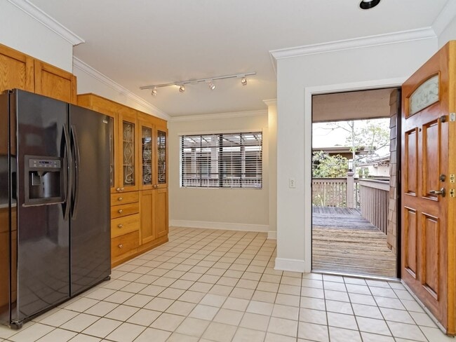 Building Photo - Water, Sewer, Trash Included! Fireplace, Washer, Dryer, 2 Assigned Parking, Garage, Open Floor Pl...