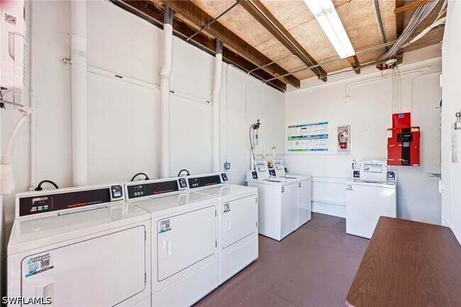 Building Photo - 25000 Tamiami Trl E