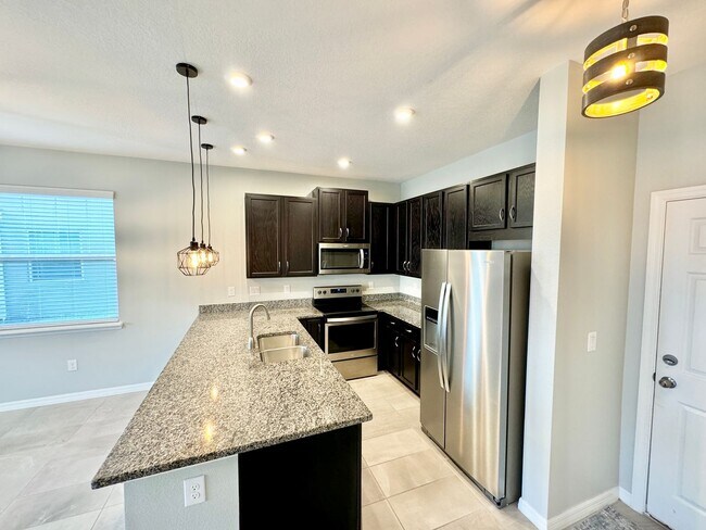 Building Photo - FOR RENT - Fantastic end unit townhouse in...